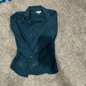 Men’s teal button up dress shirt.
